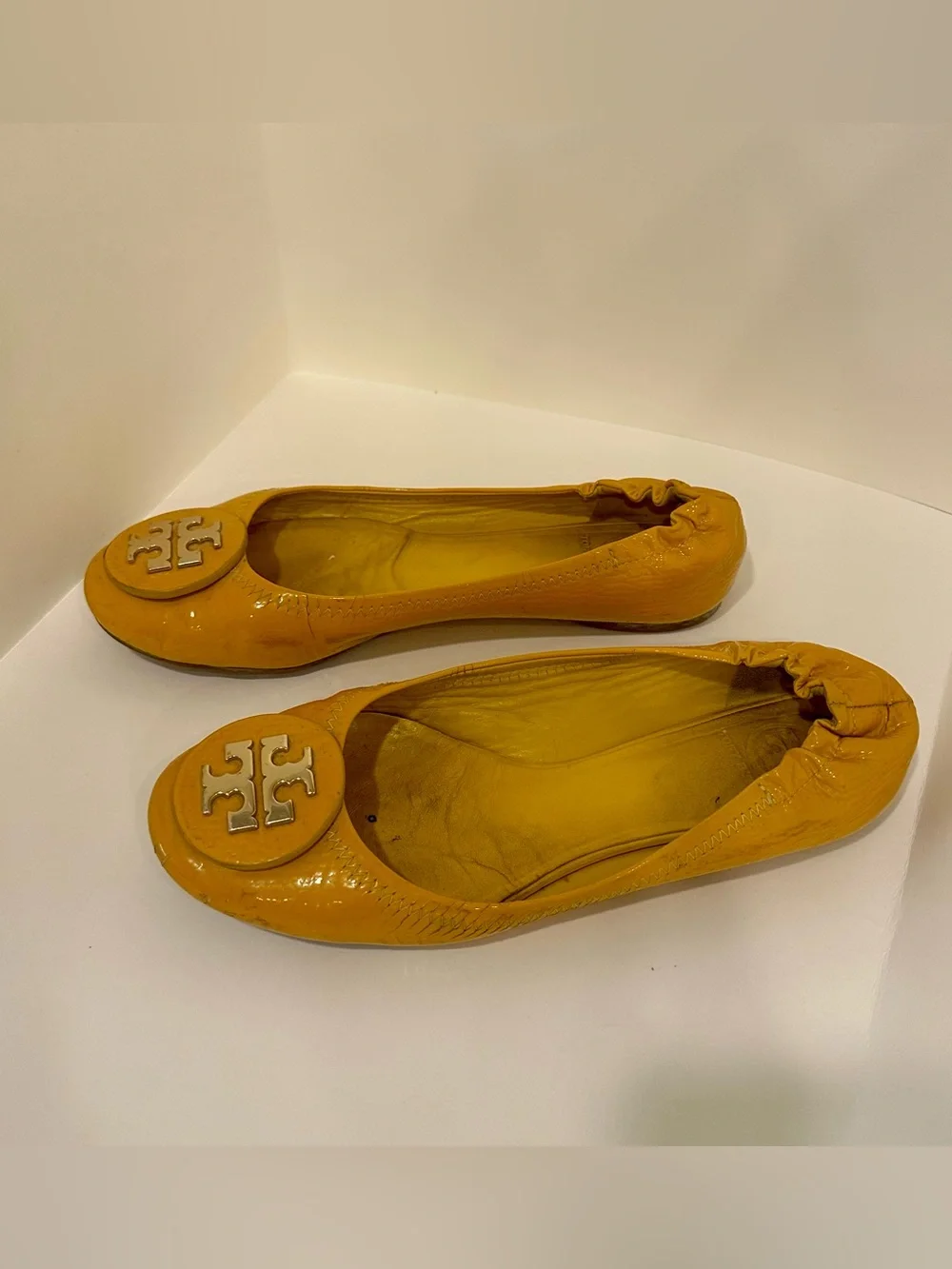 Tory Burch Patent Leather Logo Ballet Flats in Mustard Yellow